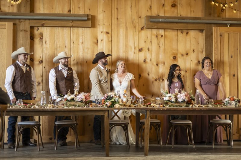 Bridal party at the reception in the barn